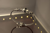 02T122502SL Floral Design Anti-Tarnish Silver Bracelet with Black Enamel & Crystals