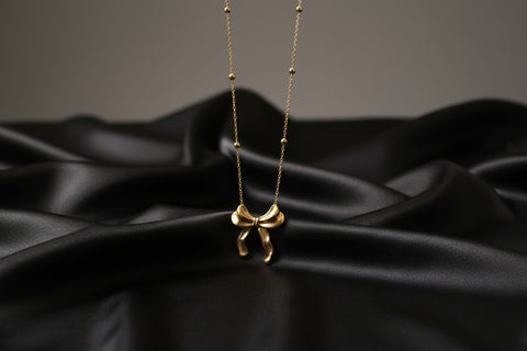 03T122509GD Premium Bow Shaped Stainless Steel Necklace
